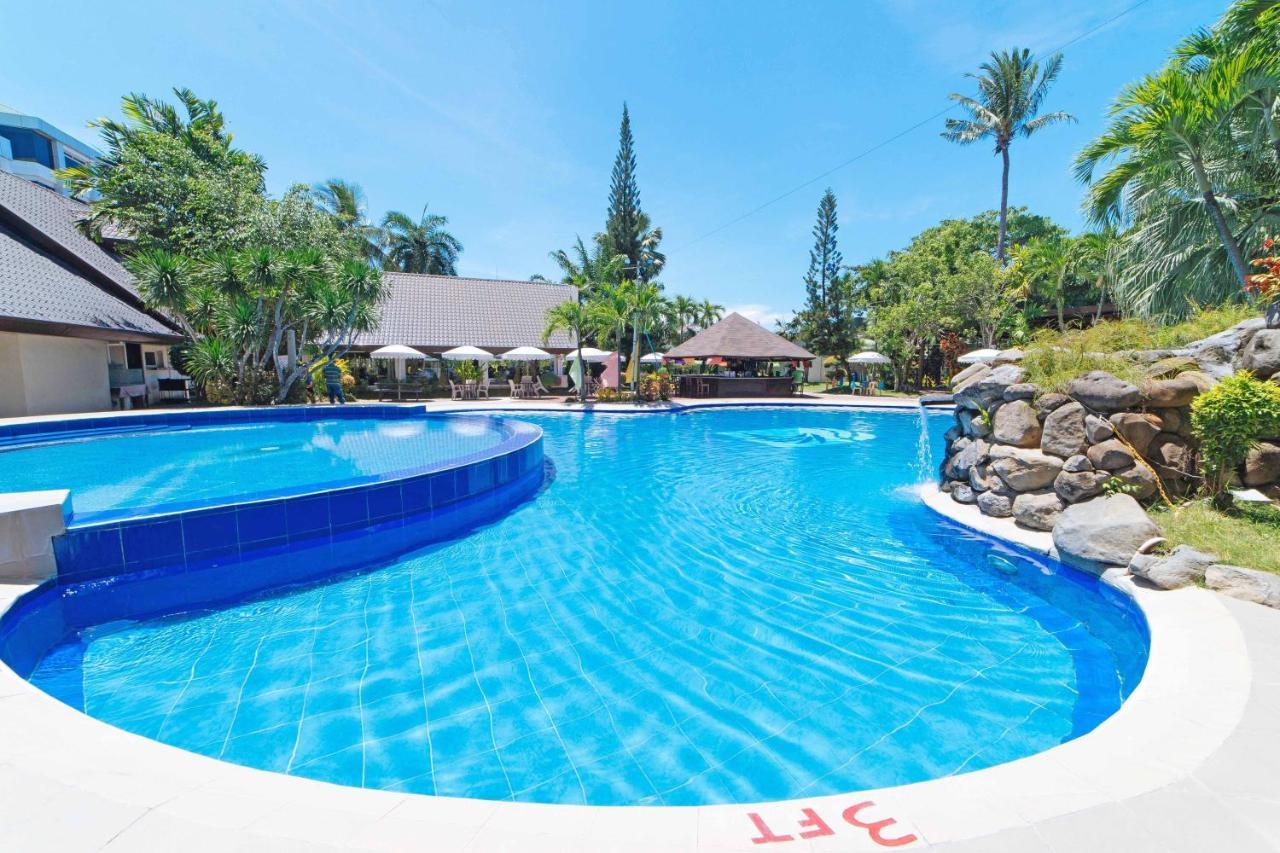Отель Reddoorz Premium @ The Ritz Garden Oases Davao Экстерьер фото