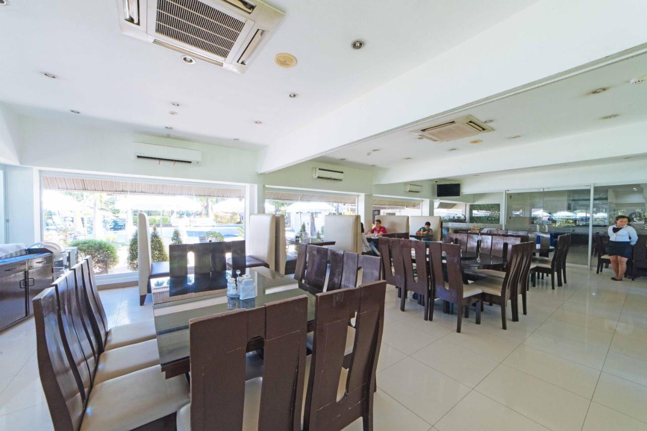Отель Reddoorz Premium @ The Ritz Garden Oases Davao Экстерьер фото