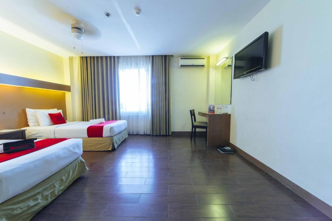 Отель Reddoorz Premium @ The Ritz Garden Oases Davao Экстерьер фото