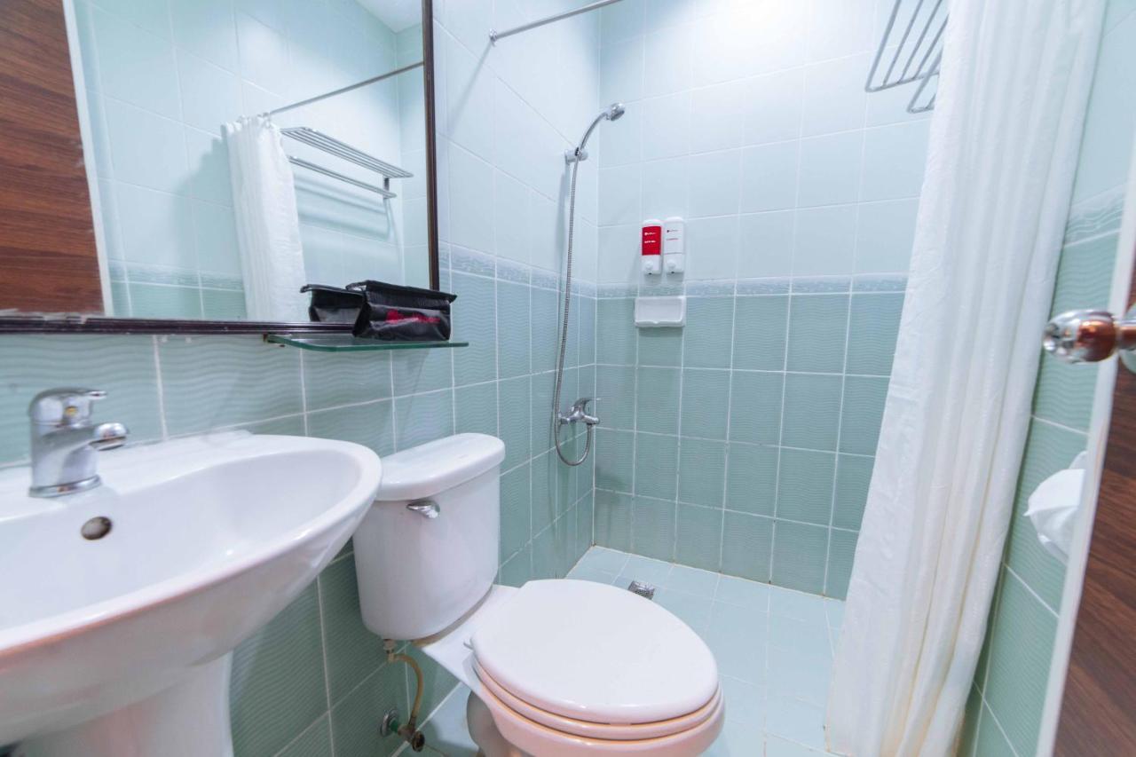 Отель Reddoorz Premium @ The Ritz Garden Oases Davao Экстерьер фото