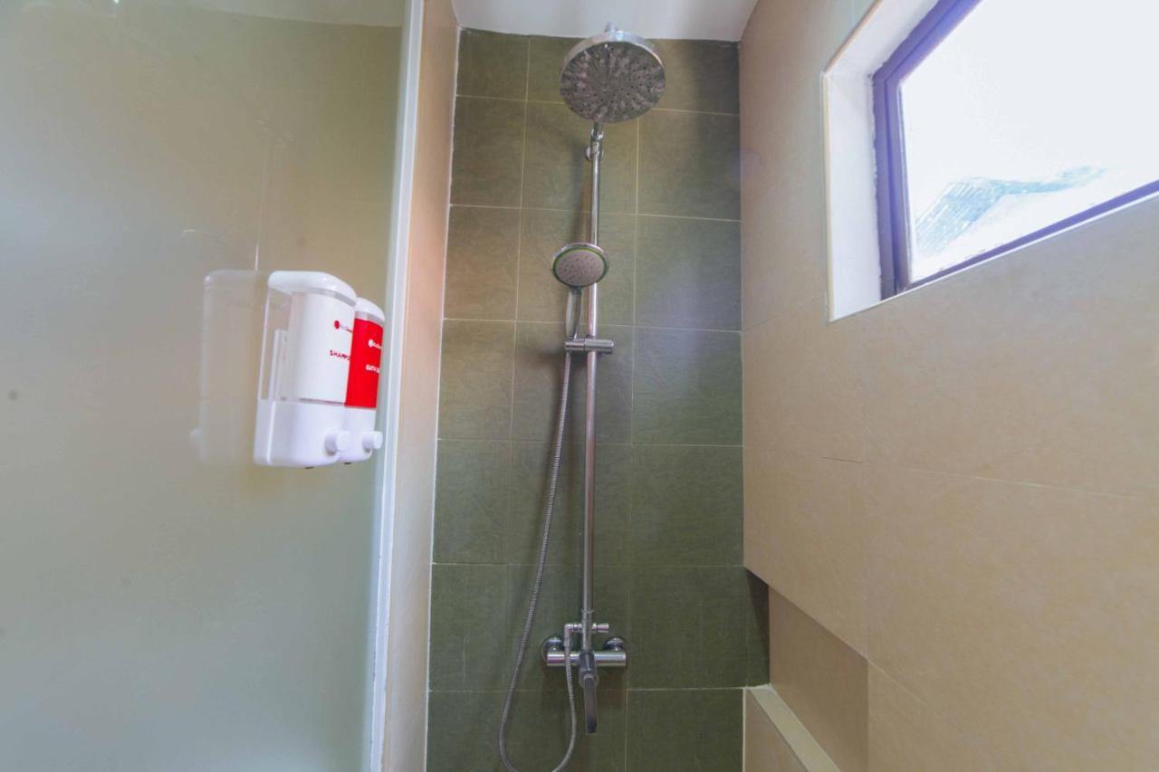 Отель Reddoorz Premium @ The Ritz Garden Oases Davao Экстерьер фото